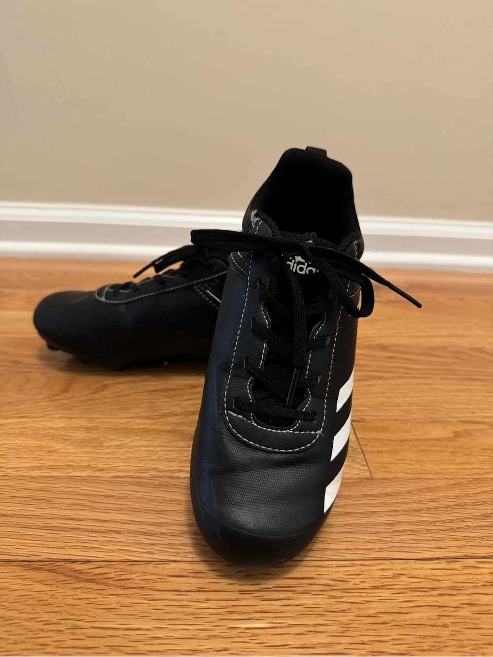 Adidas Kids’ Rundown Black Baseball Cleats with White Stripes - Size 4